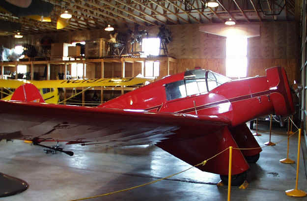 Aeronca L with lots of antique engines and a Cub behind
