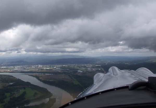 Below low clouds looking over the Columbia river and Kelso, Washington